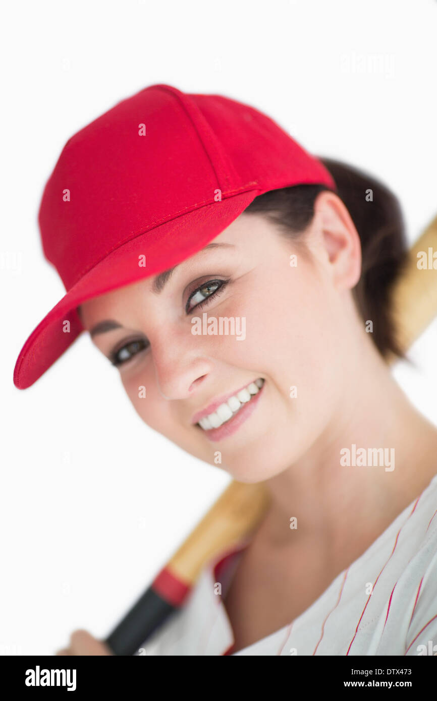Happy woman with baseball bat and hat Stock Photo Alamy