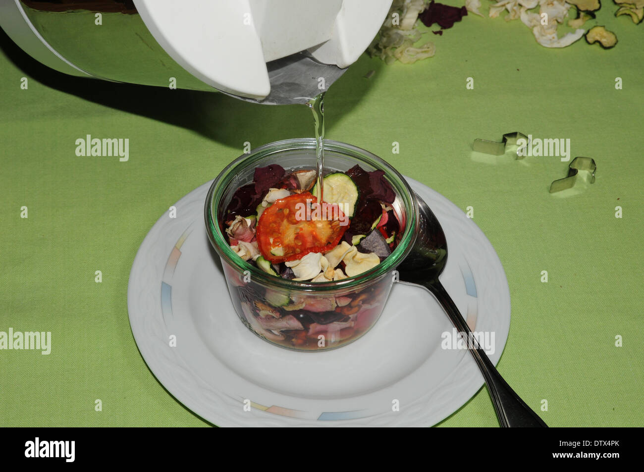 Preparing a soup with hot water Stock Photo