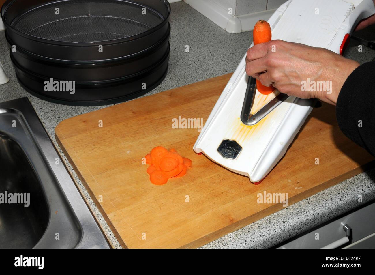 Cutting carrots Stock Photo