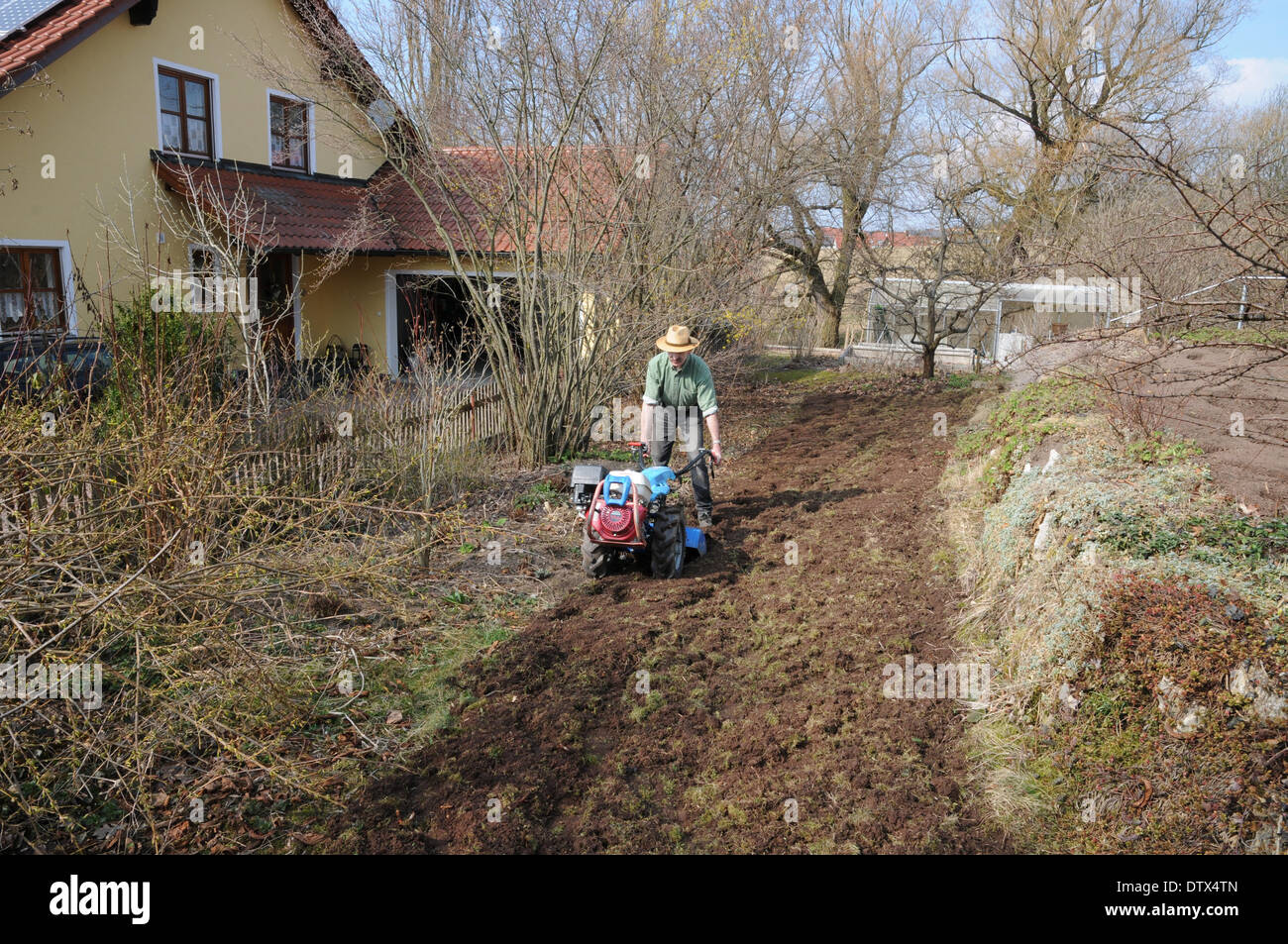 Tiller in action Stock Photo Alamy