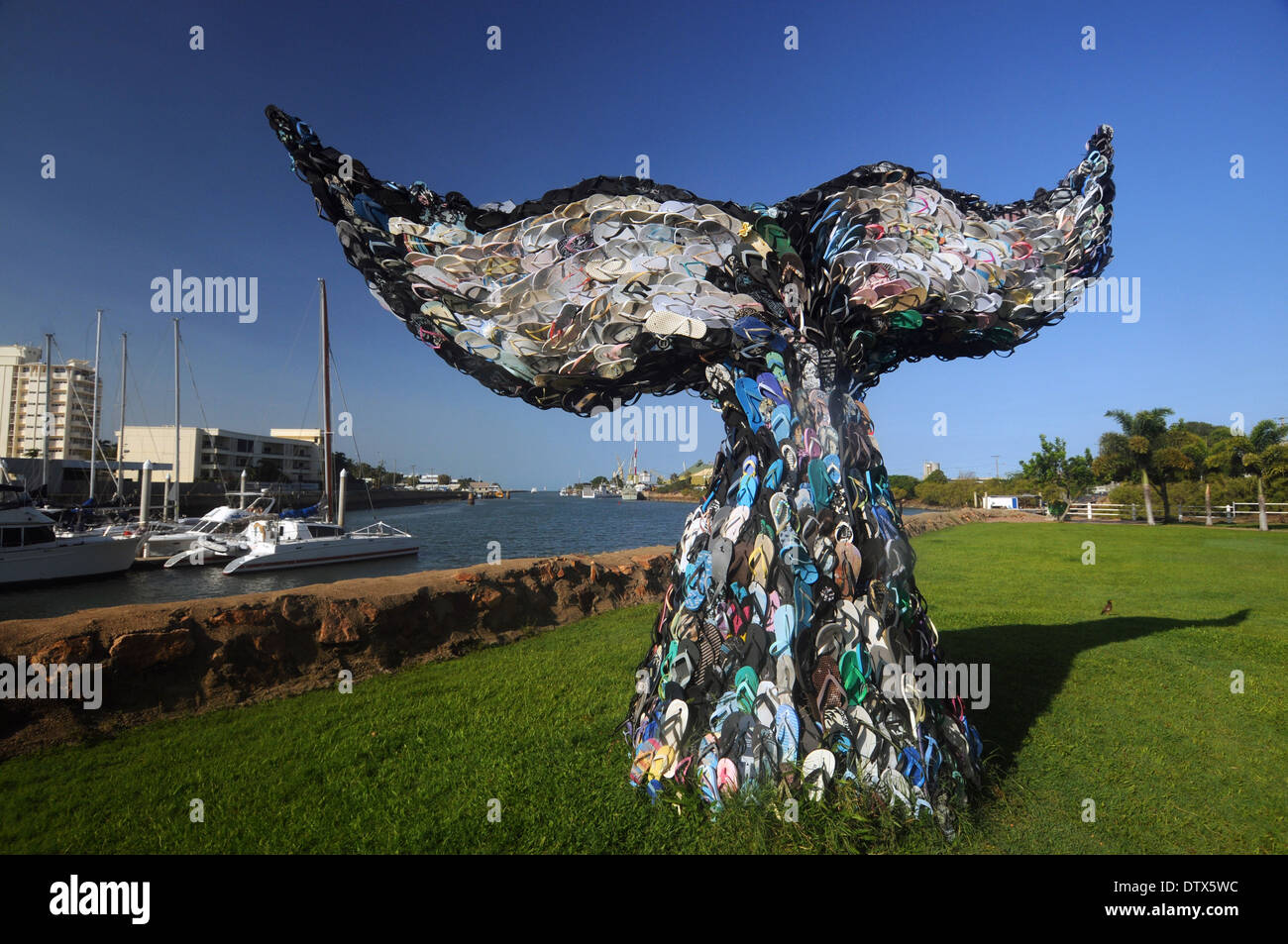 Art from beach litter - whale tail made of recycled flip-flops (thongs) by the marina, Townsville, Queensland, Australia. No PR Stock Photo
