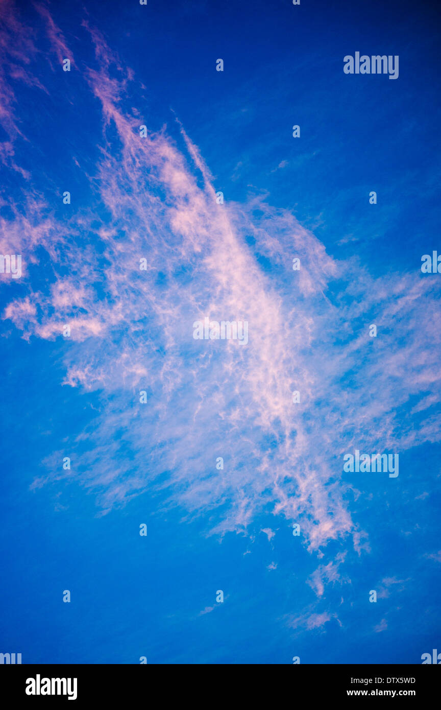 Pink clouds against blue sunset sky in Colorado, USA Stock Photo - Alamy