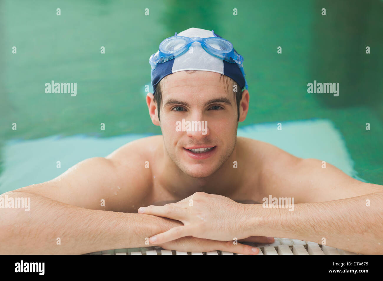 Happy man in the swimming pool Stock Photo