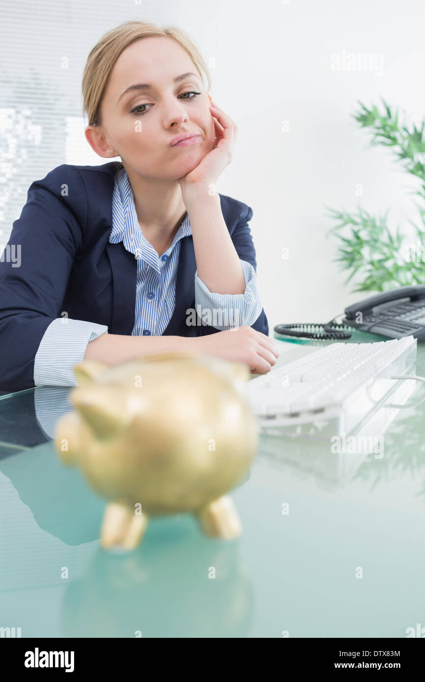 Upset business woman with piggy bank office Stock Photo - Alamy