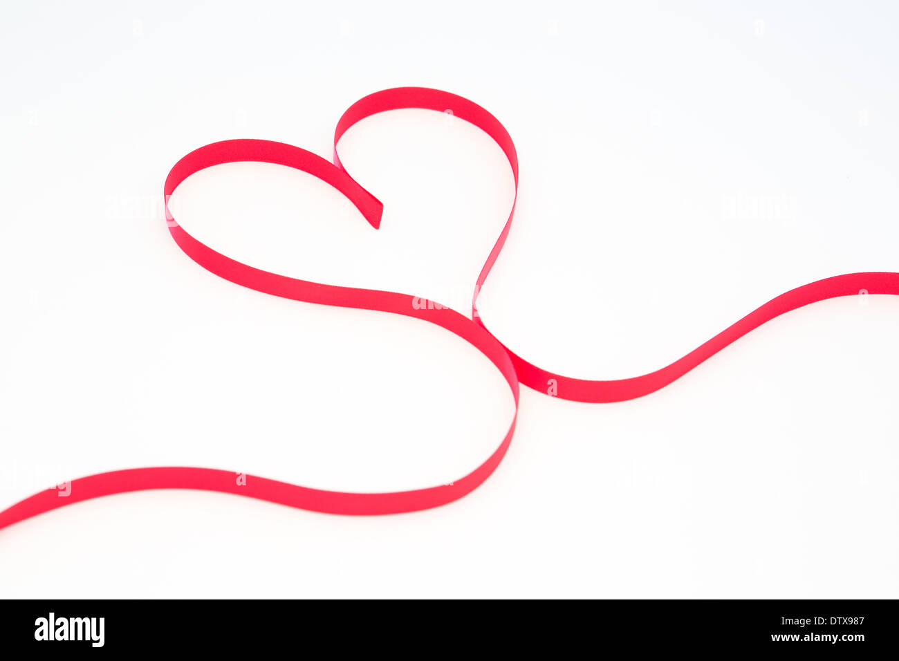 Pink ribbon in heart shape Stock Photo - Alamy