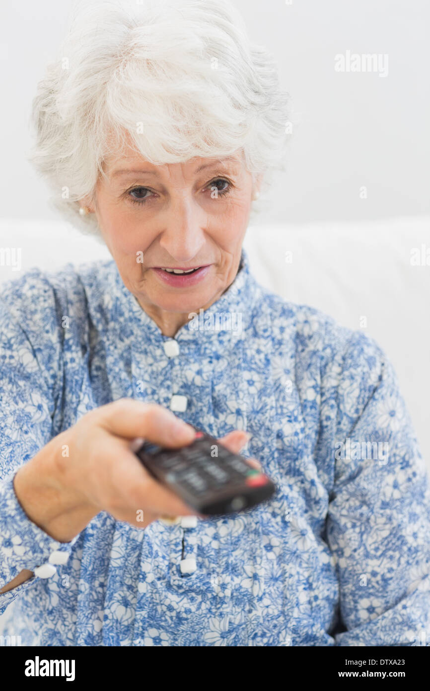 Focused elderly woman sitting hi-res stock photography and images - Alamy