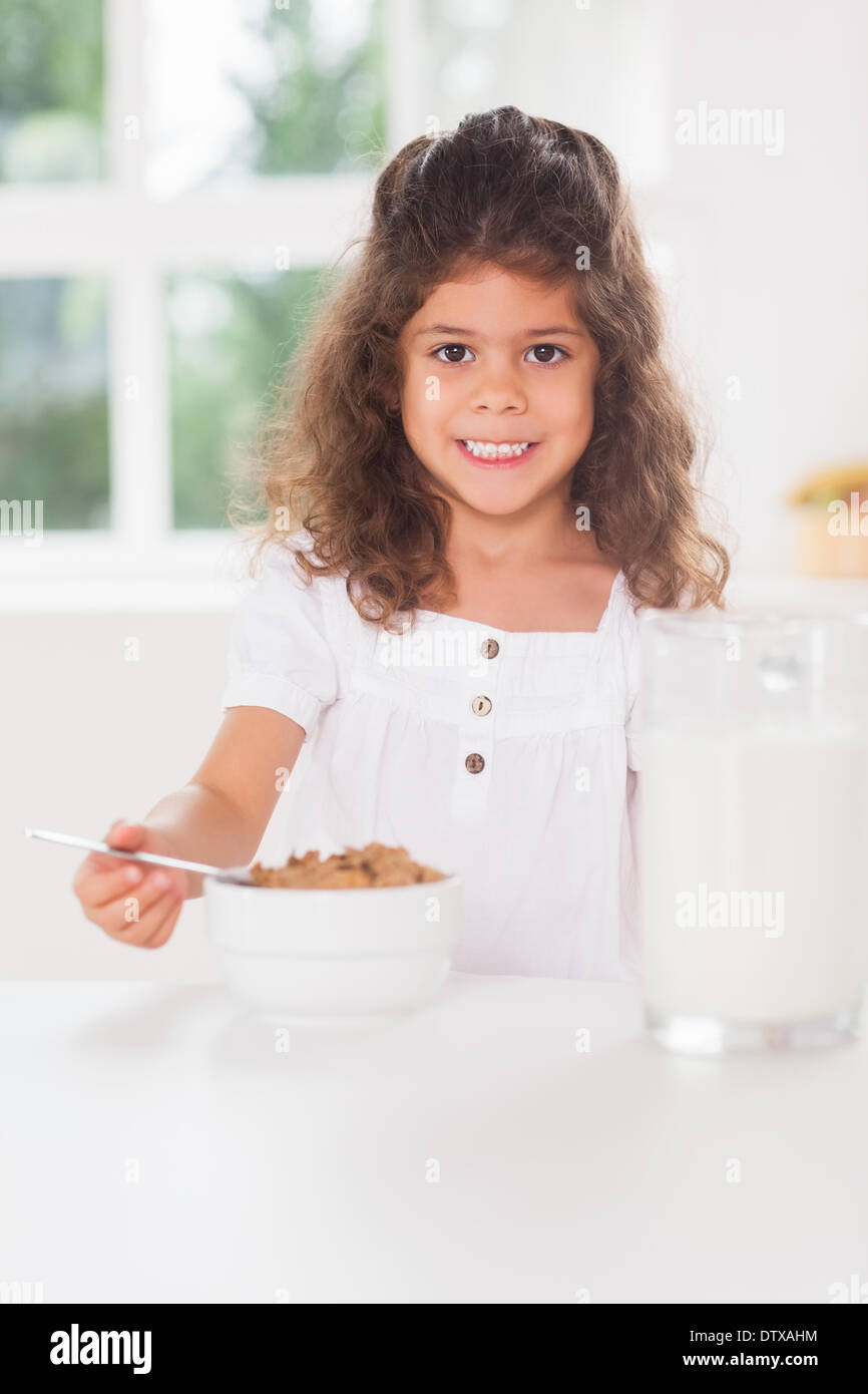 Little girl having cereal Stock Photo Alamy