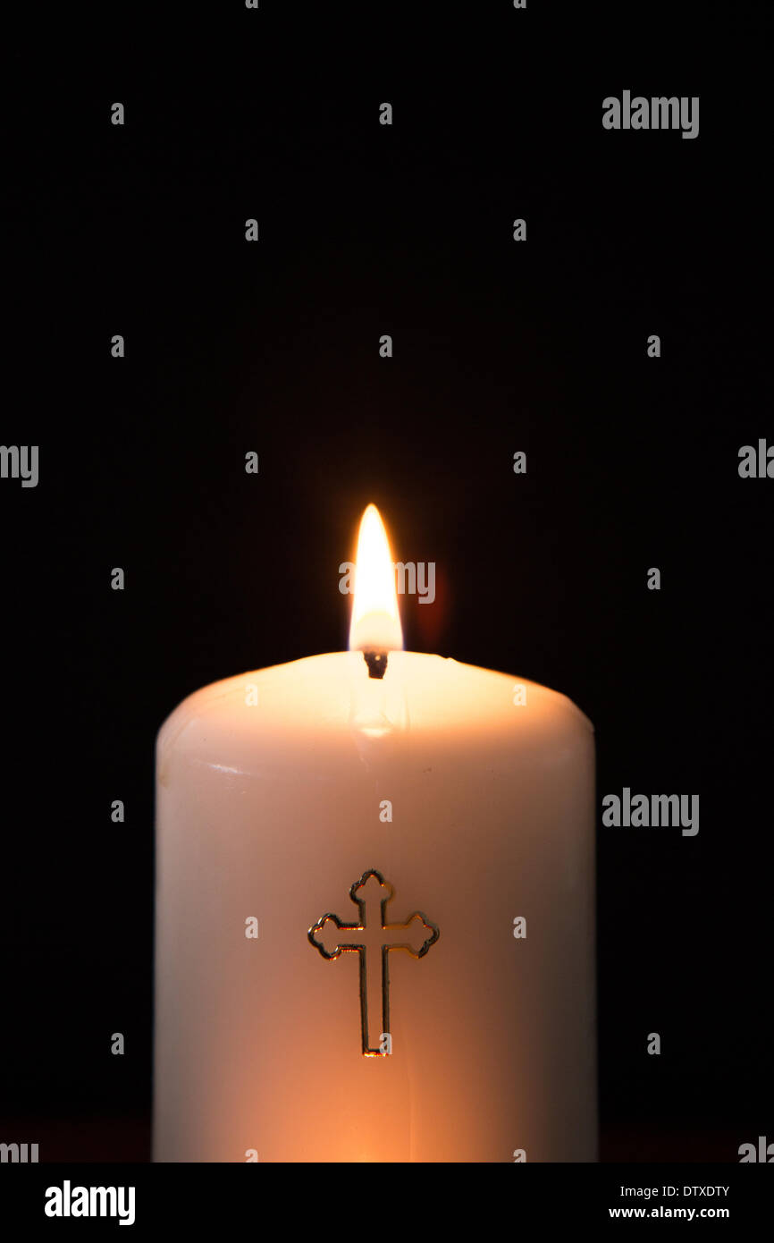 Catholic candle burning Stock Photo Alamy