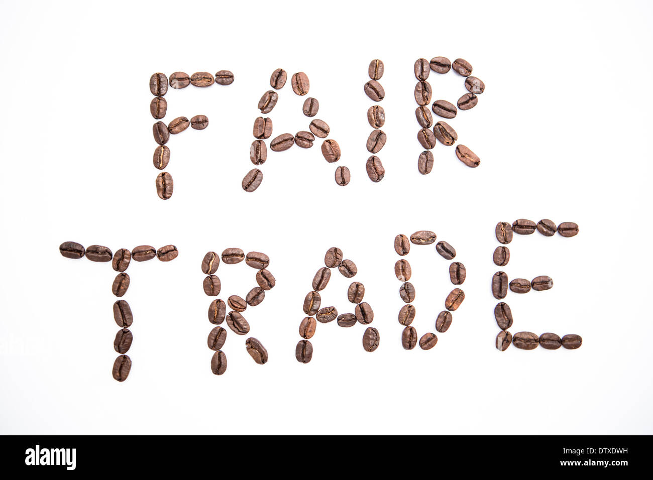 Fair trade spelled out in coffee beans Stock Photo Alamy
