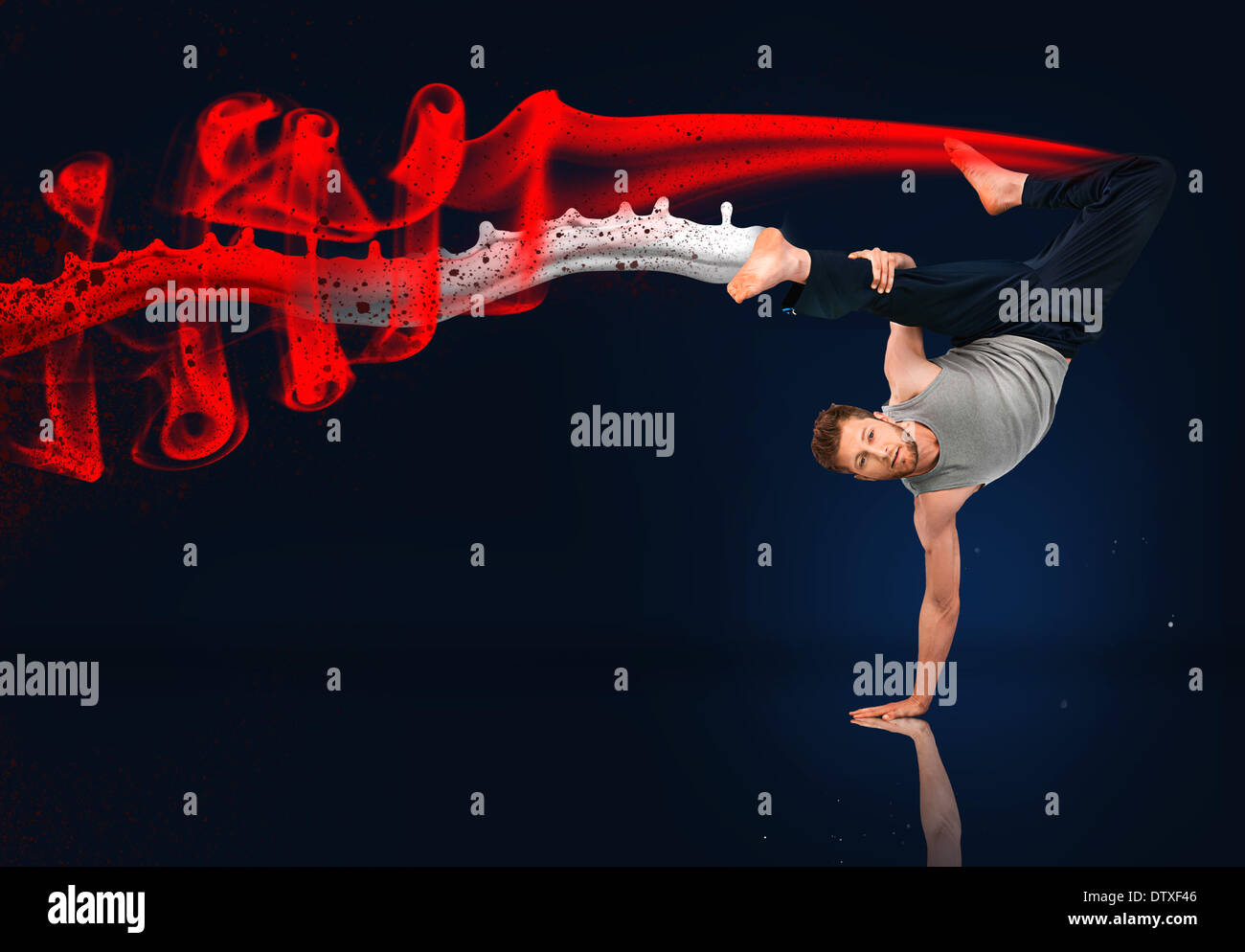 Martial arts expert doing hand stand Stock Photo Alamy