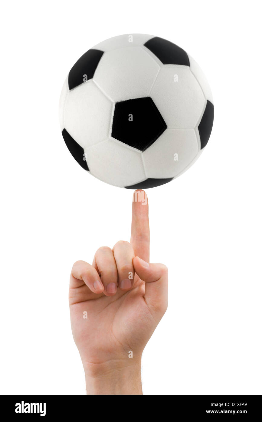 Hand and spinning soccer ball Stock Photo Alamy