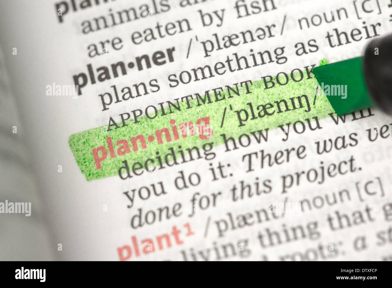 Planning definition highlighted in green Stock Photo Alamy