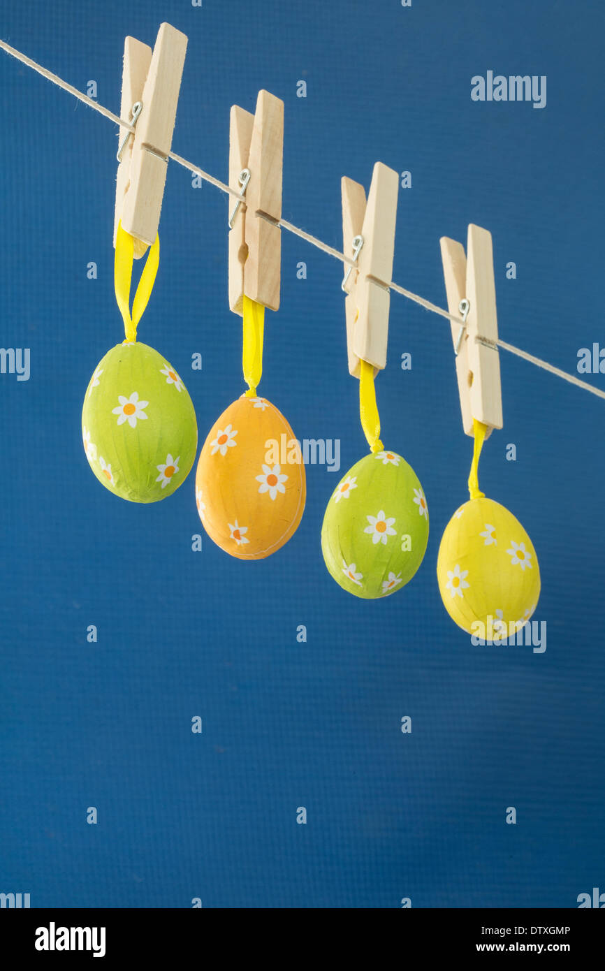 Easter eggs hanging from a washing line Stock Photo