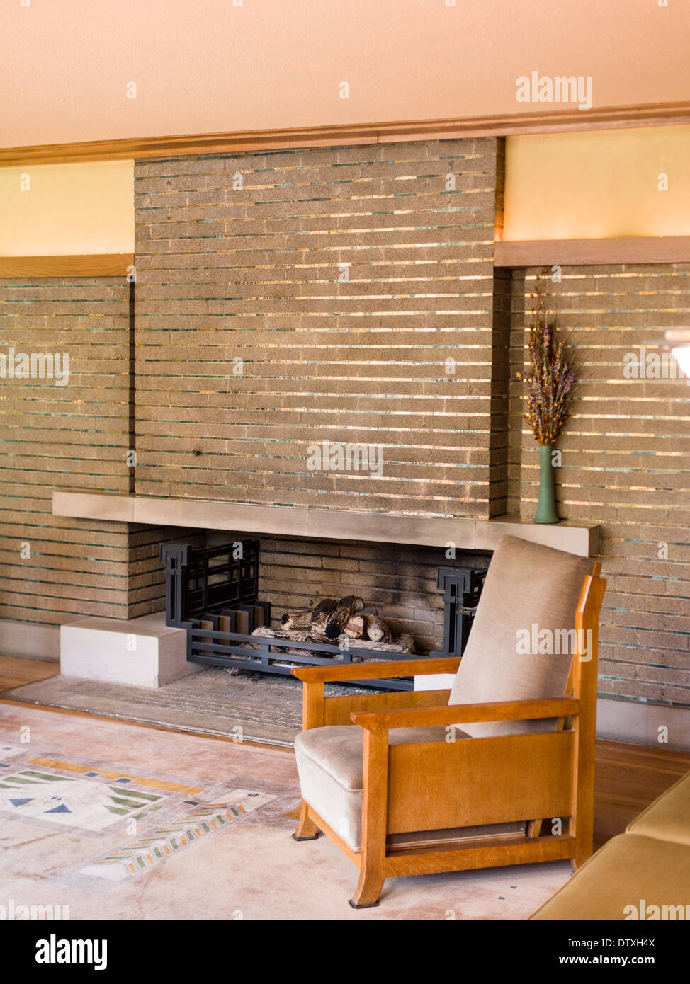 Meyer May House Fireplace with FLR Chair. The horizontal is emphasized