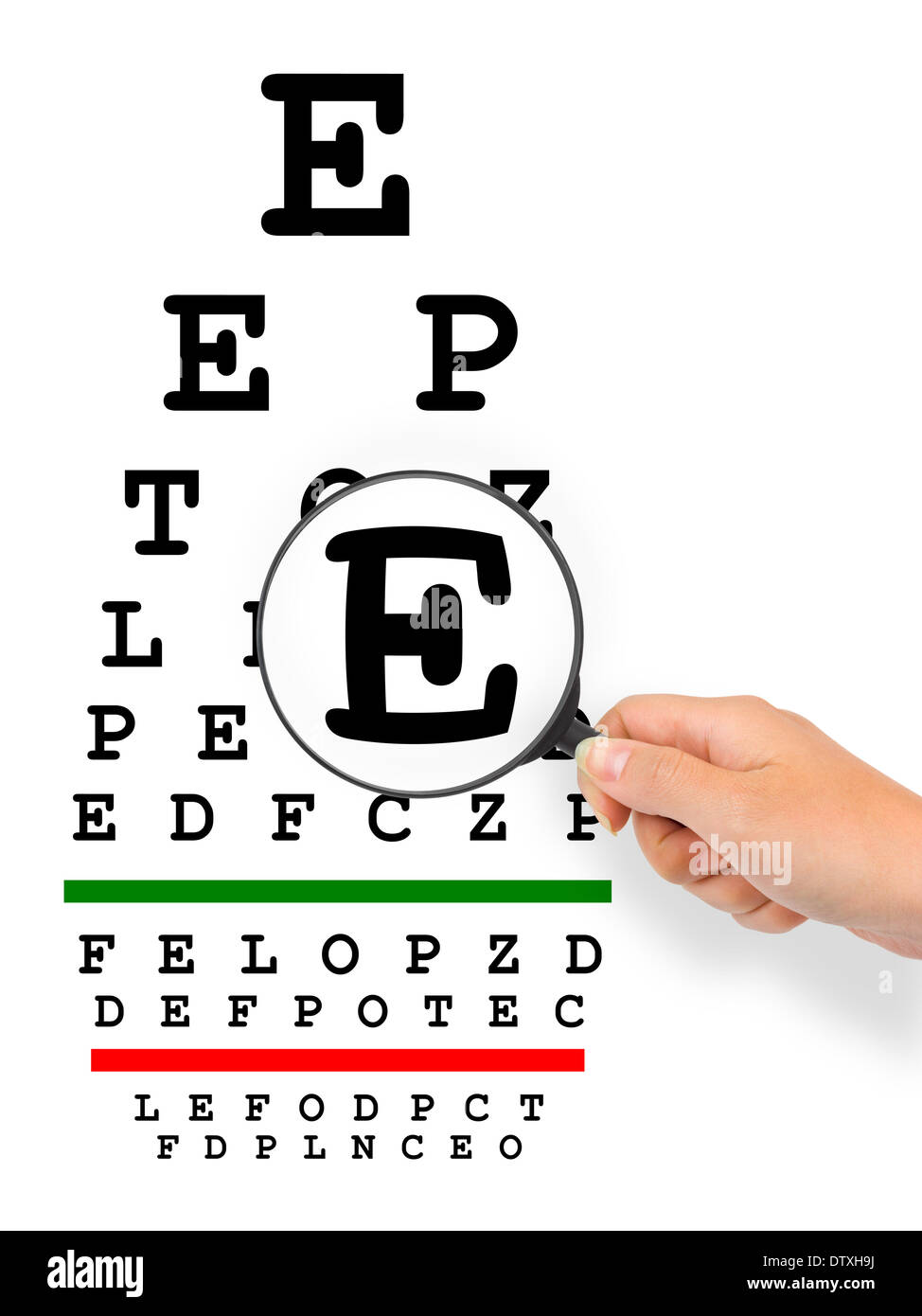Hand with magnifier and eyesight test chart Stock Photo Alamy