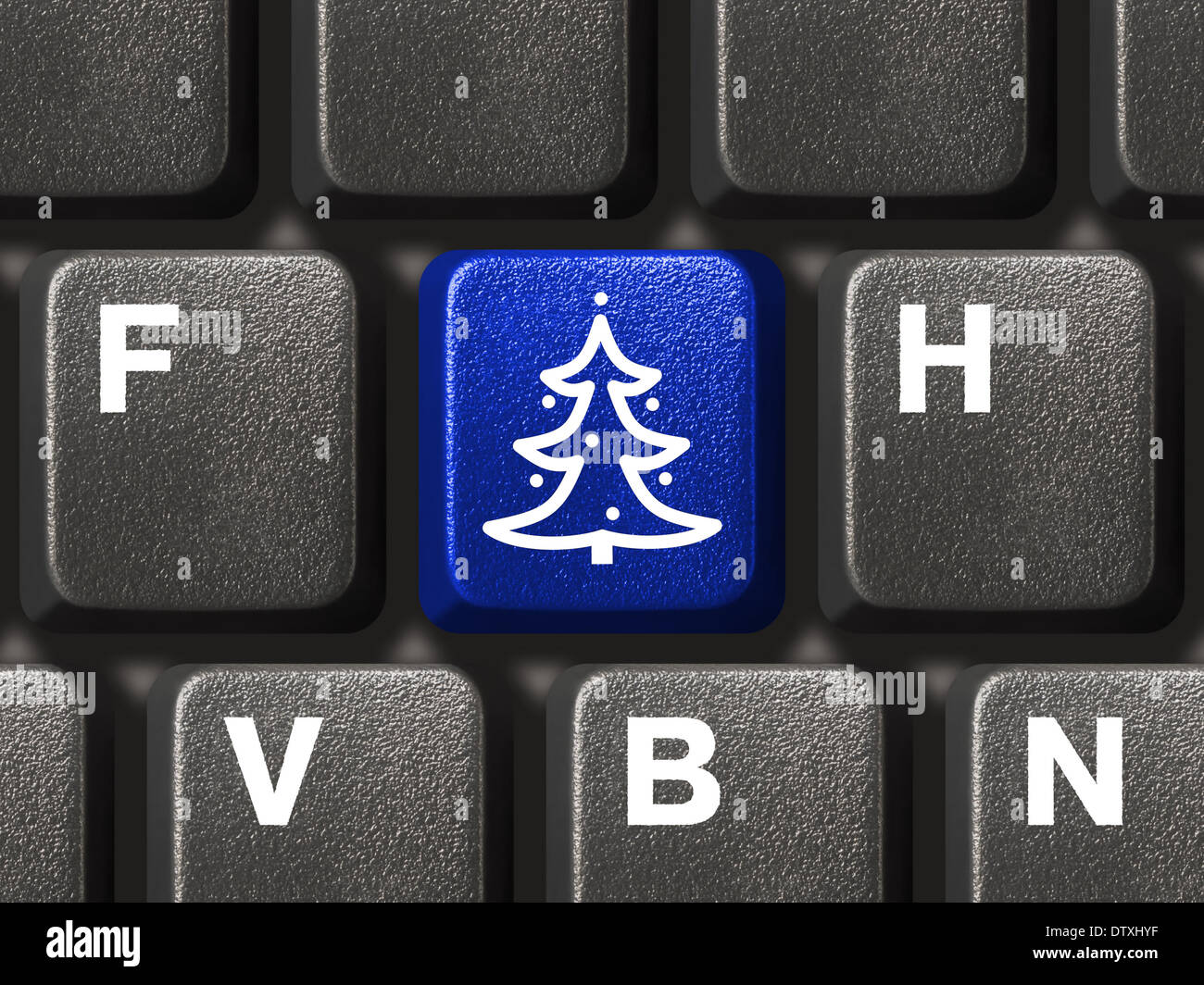 Computer keyboard with Christmas tree key Stock Photo Alamy
