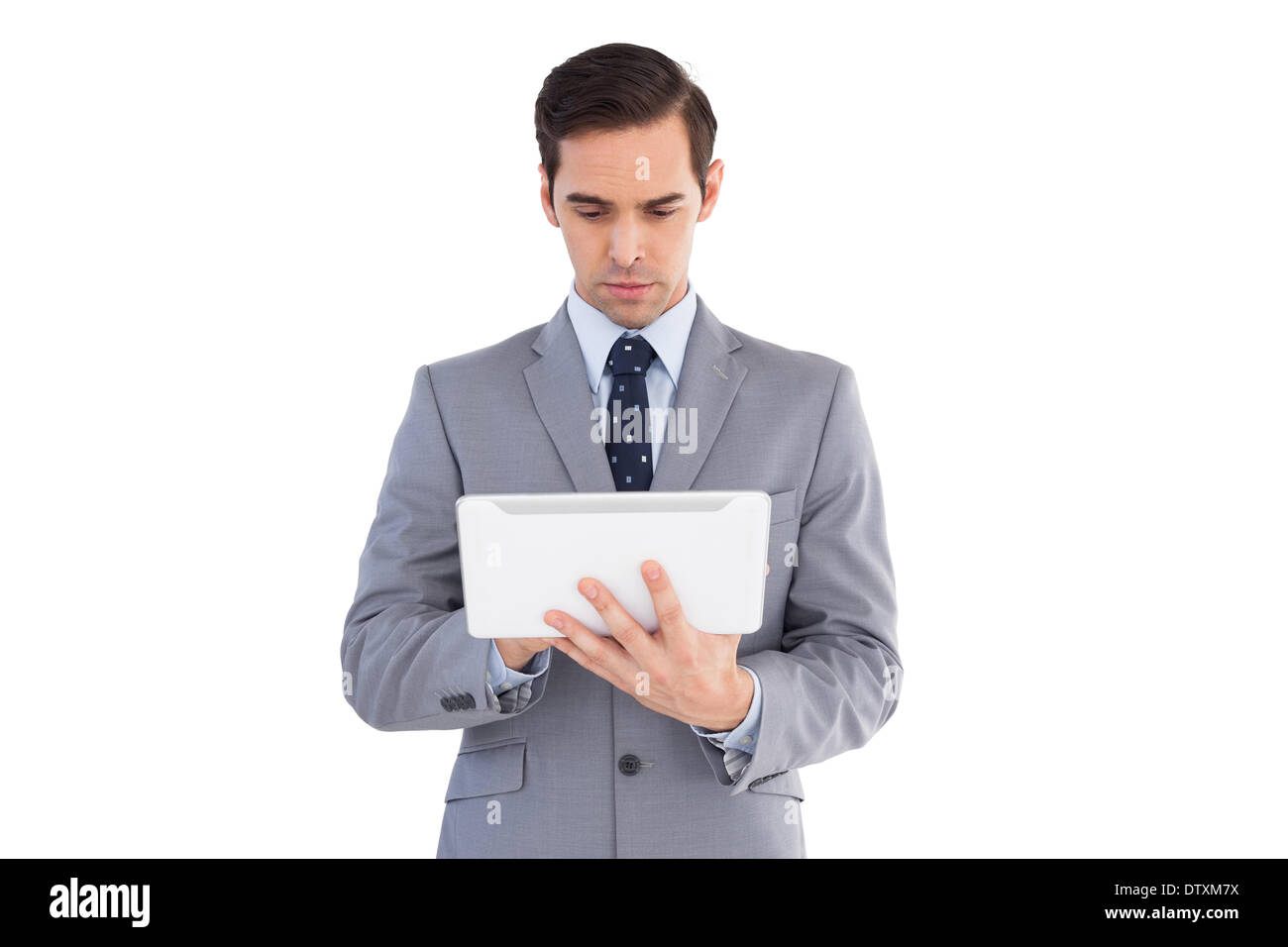 Businessman holding a tablet computer Stock Photo