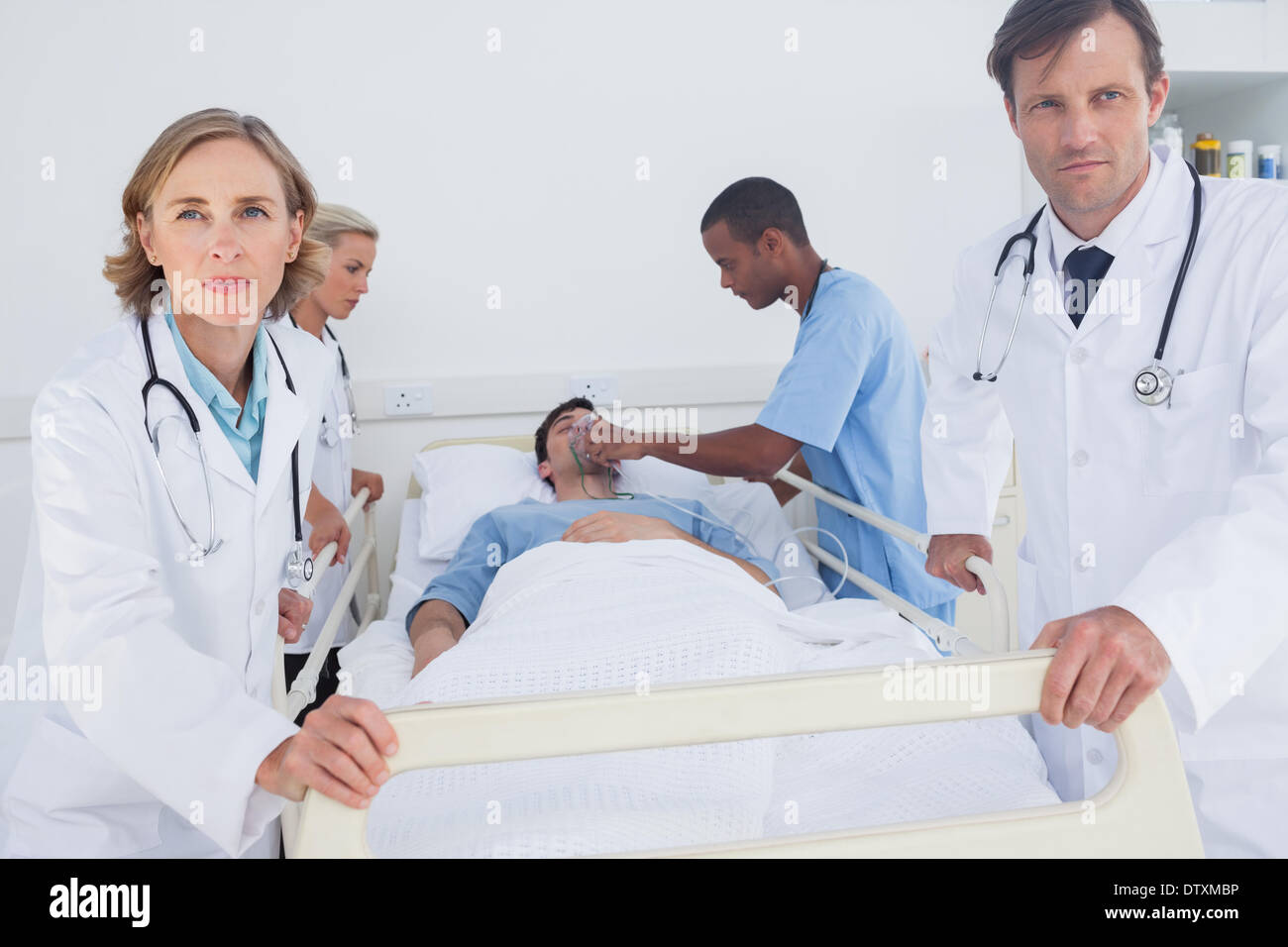 Serious doctors ready to move Stock Photo Alamy