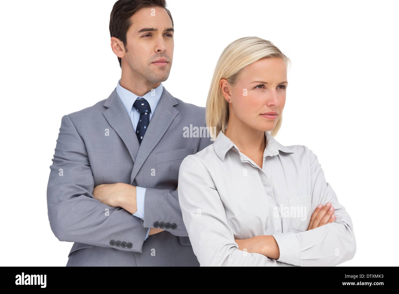 Serious colleagues looking at the same way Stock Photo