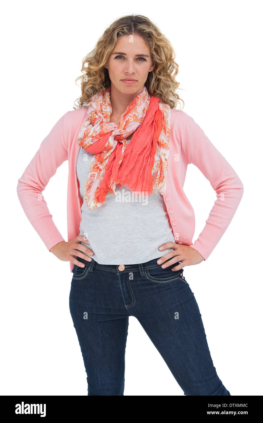 Blonde woman posing with hands on hips Stock Photo - Alamy