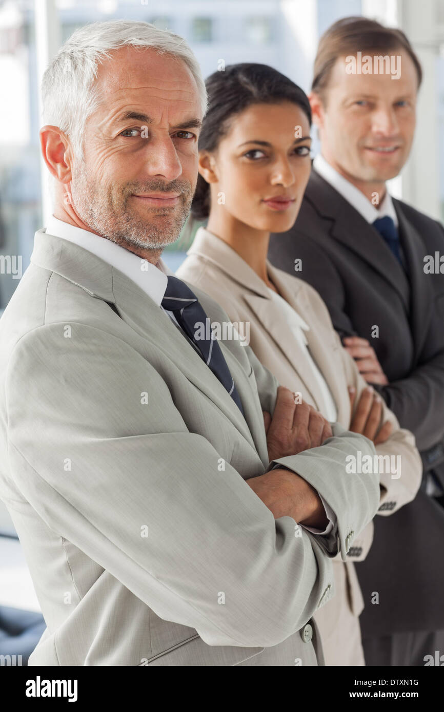 Business people looking in the same way Stock Photo