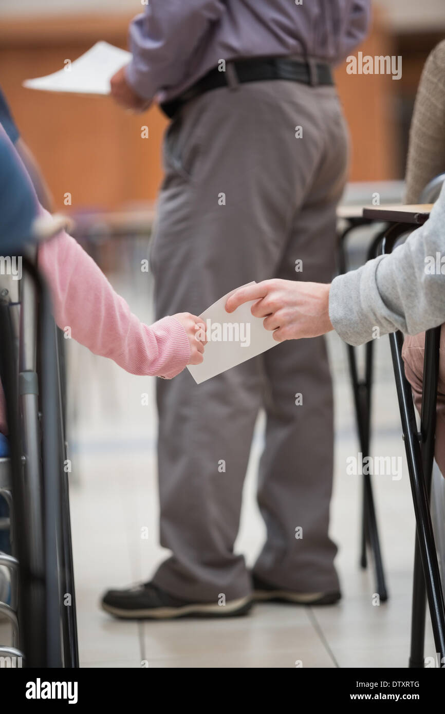Students cheating on a test Stock Photo