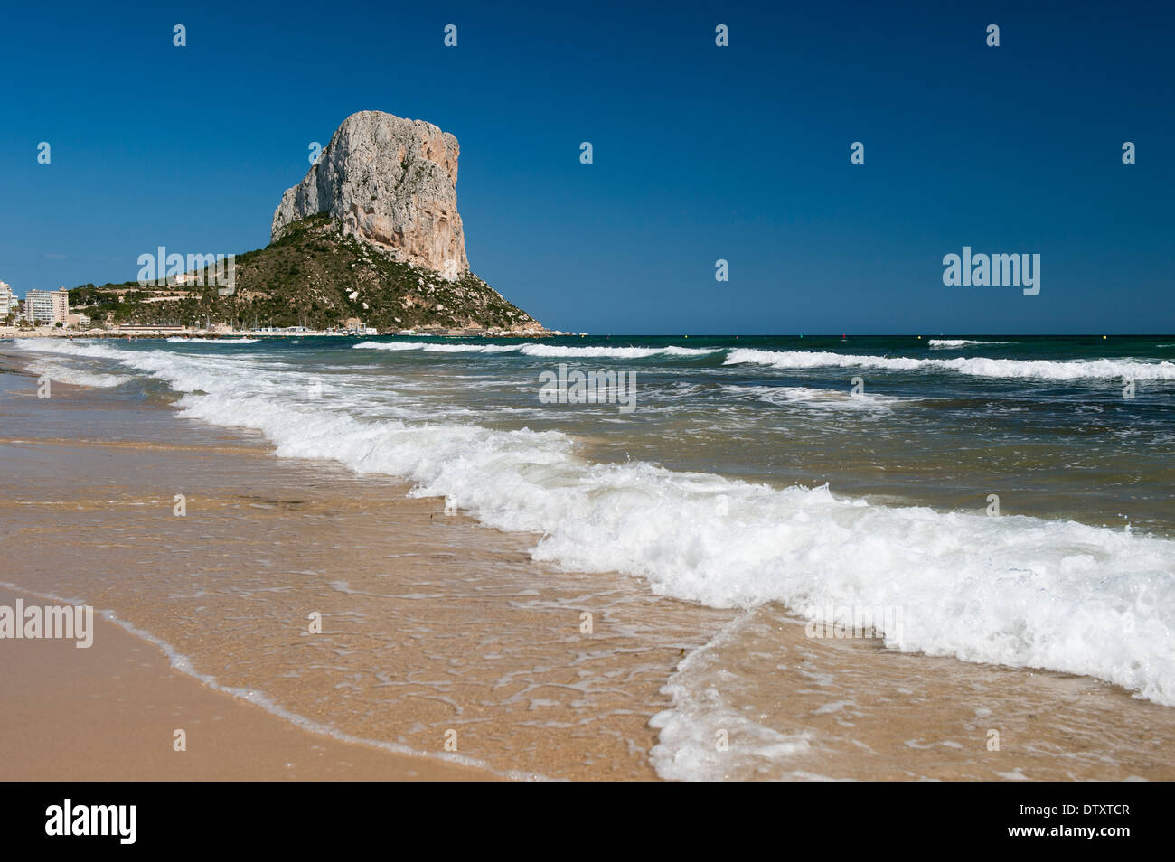 The imposing Penyal d'lfac outcrop in the bay of Calp, Costa Brava, Spain. Stock Photo
