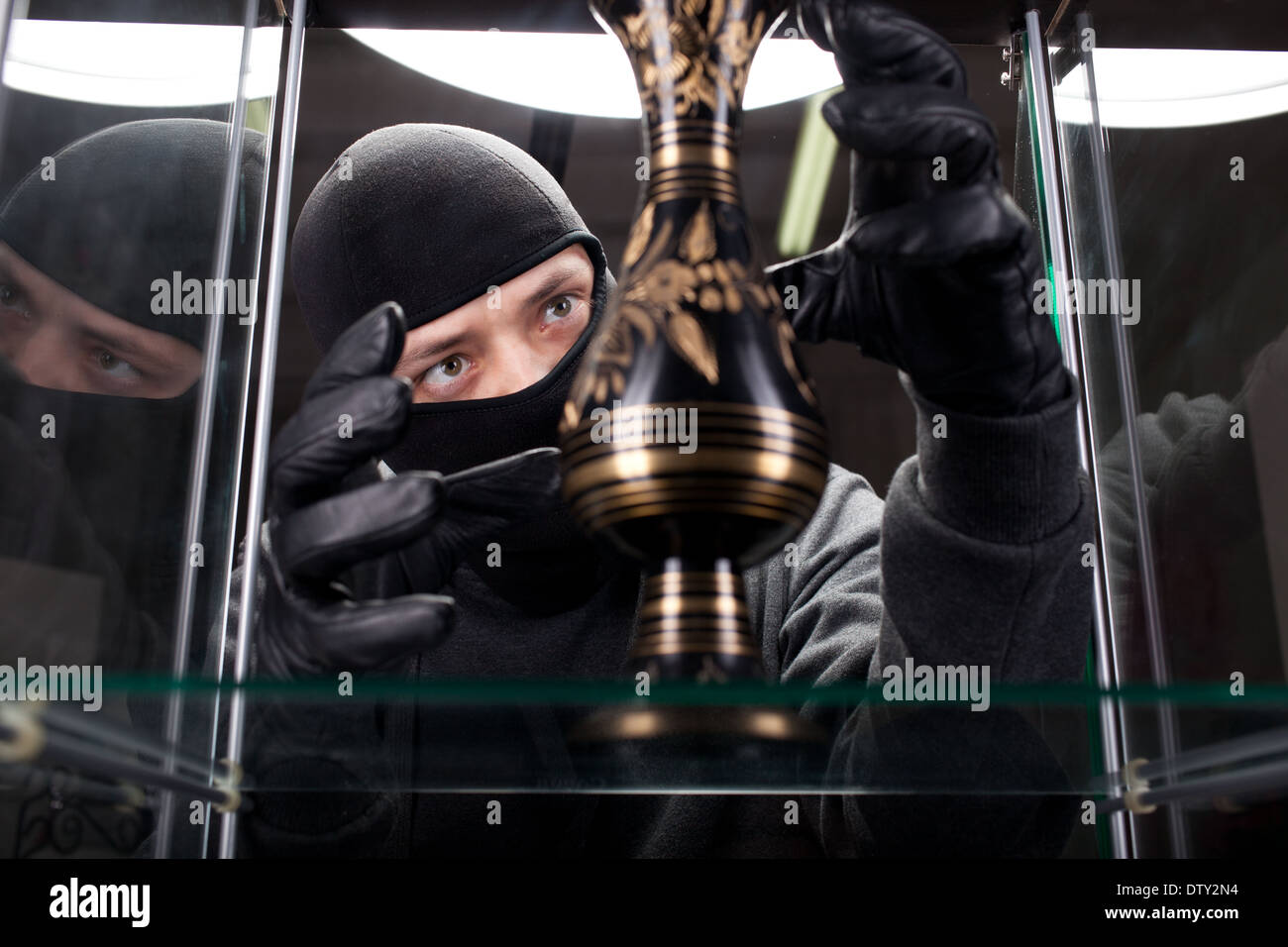 burglar wearing black mask Stock Photo - Alamy