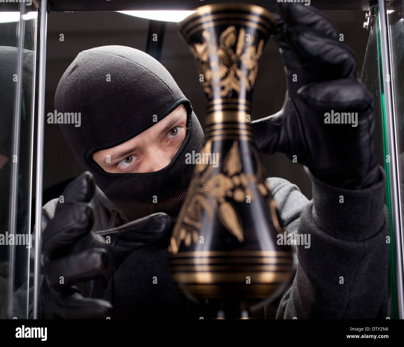 burglar wearing black mask Stock Photo - Alamy