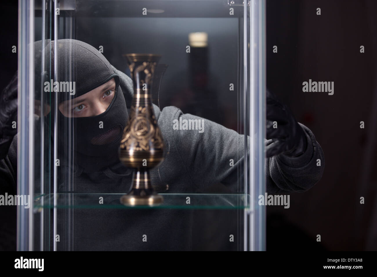 burglar wearing black mask Stock Photo - Alamy