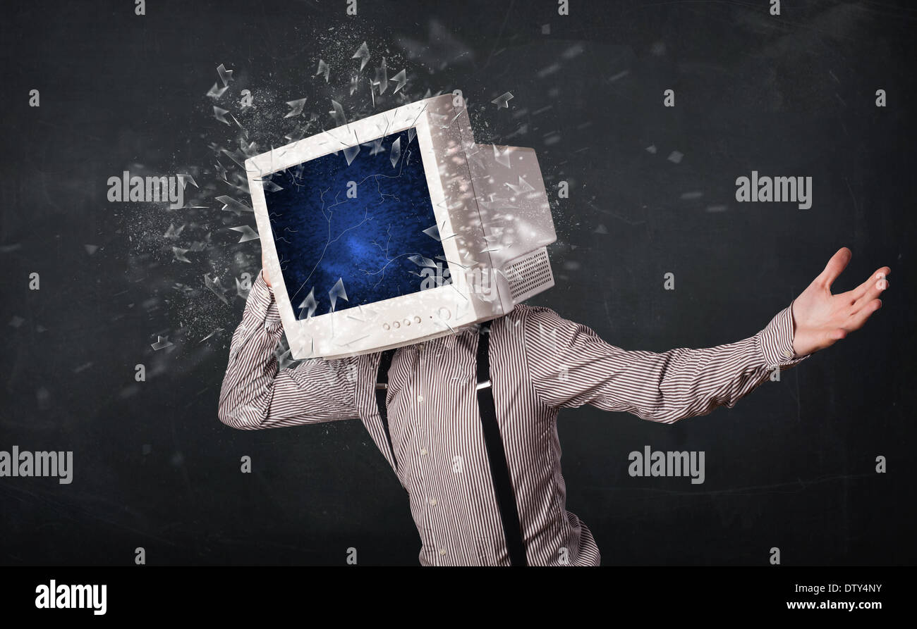 Computer monitor screen exploding on a young persons head Stock Photo ...