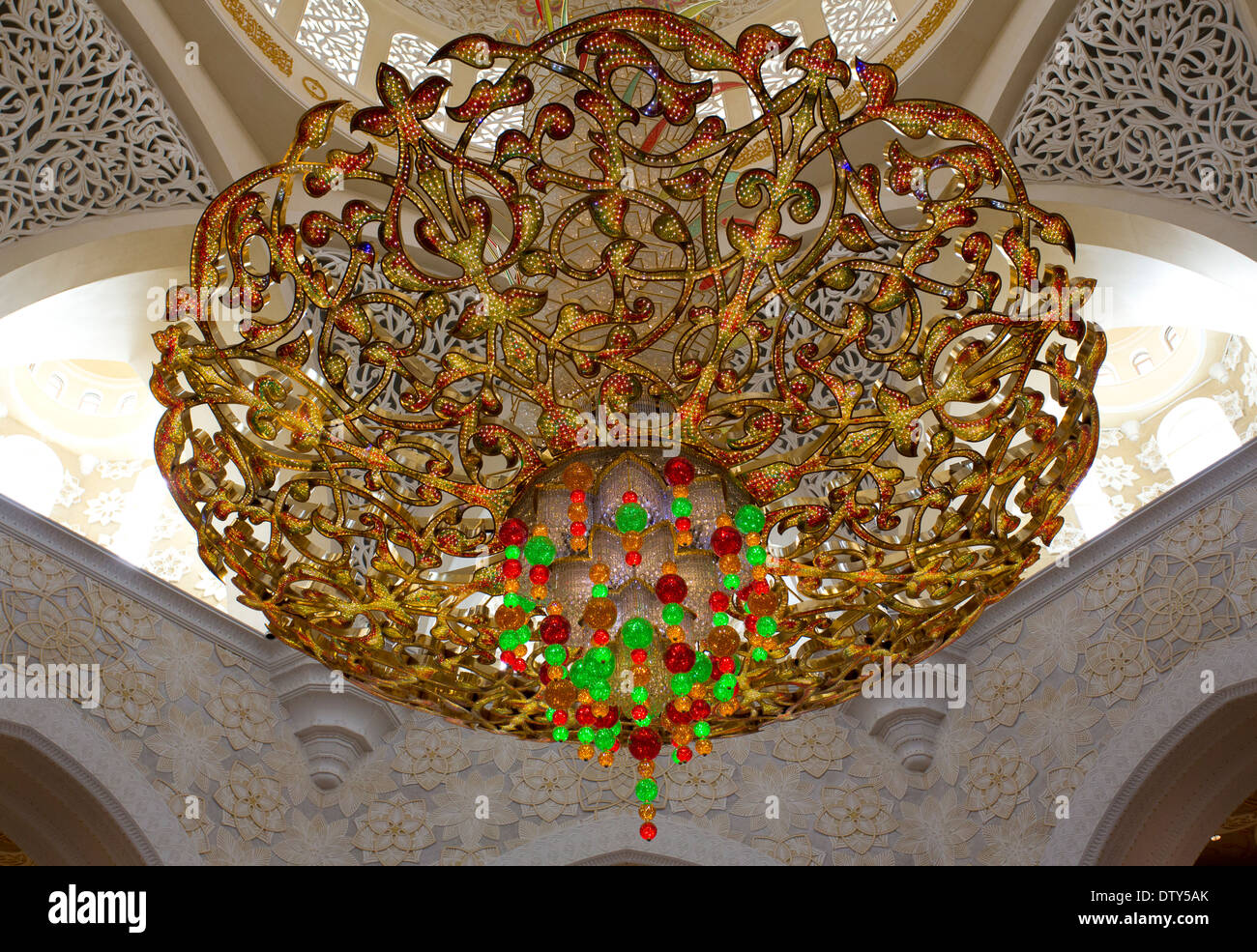 Sheikh Zayed Grand Mosque in Abu Dhabi United Arab Emirates interior showing a giant decoration hanging from the ceiling. Stock Photo