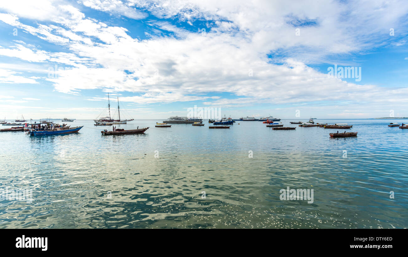 Boats anchored near the shores of Zanzibar, Tanzania Stock Photo