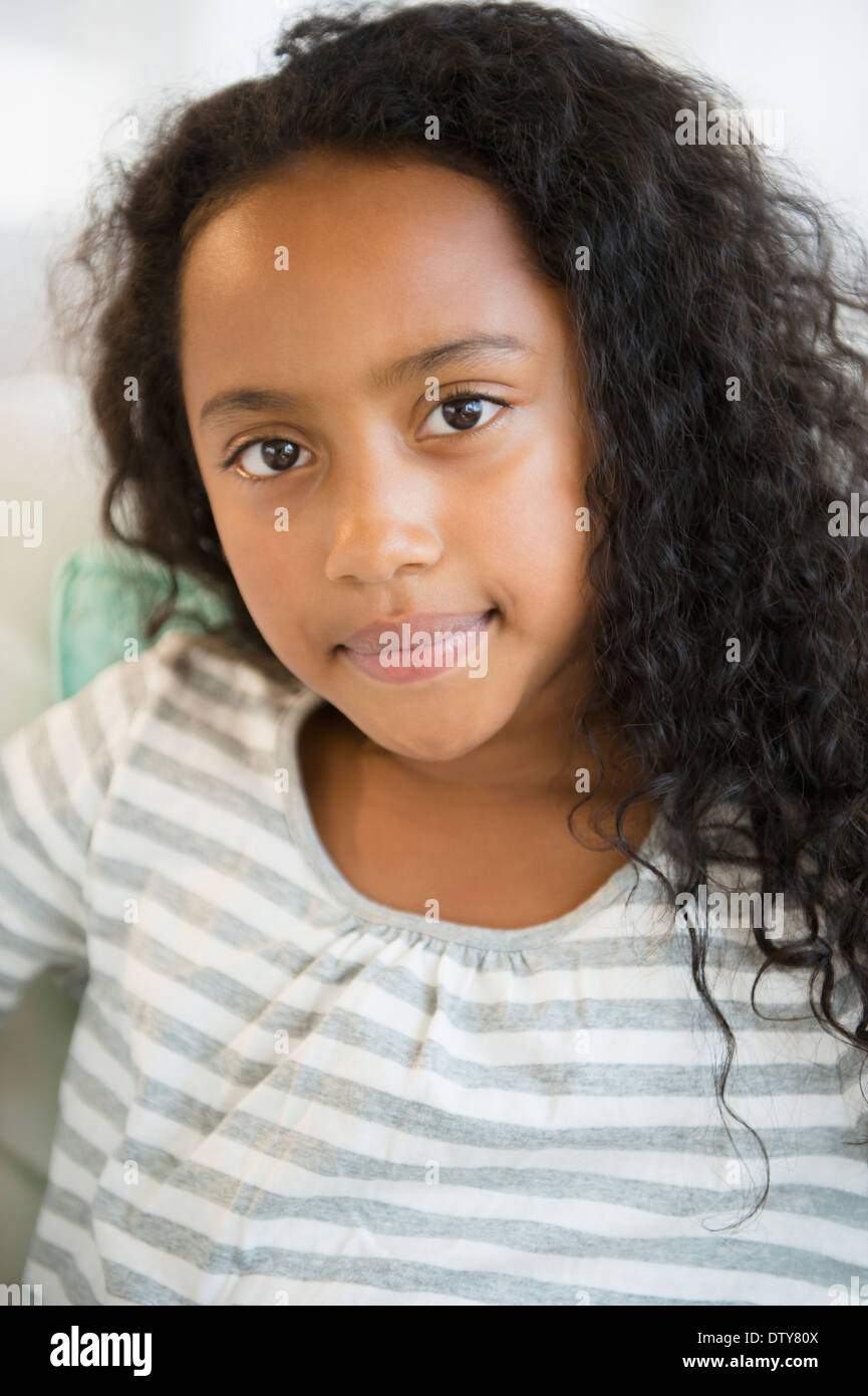 Mixed race girl smiling Stock Photo Alamy
