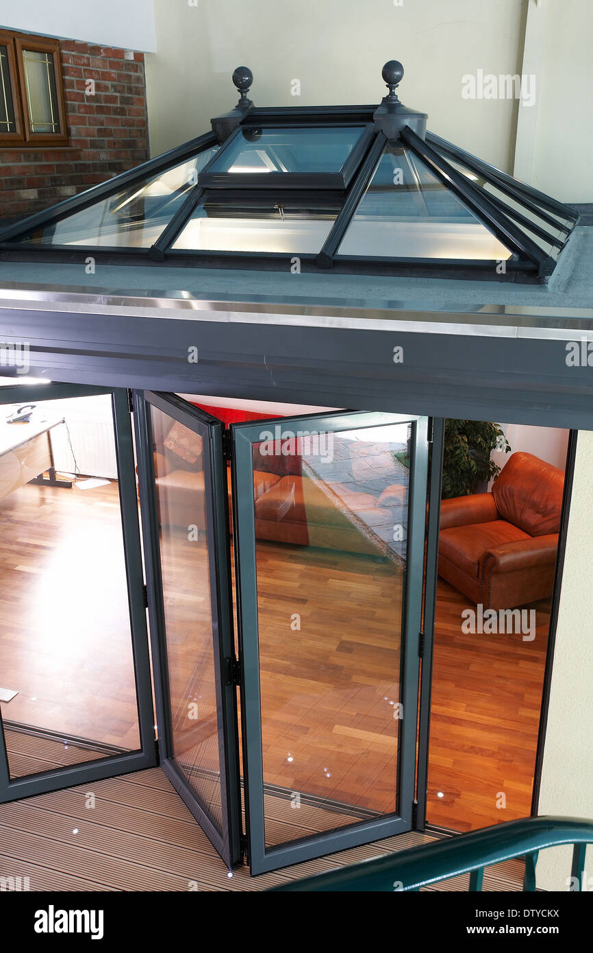 A series of images showing folding doors and skylight on an orangery ... A series of images showing folding doors and skylight on an orangery ...
