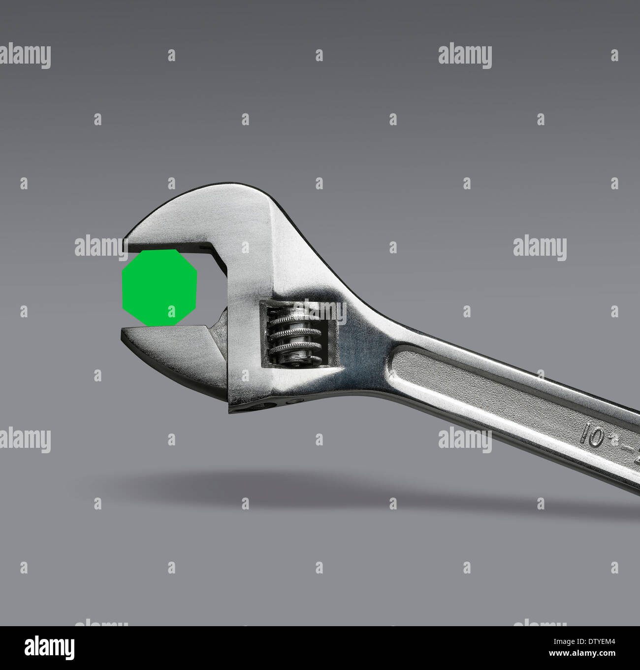 Adjustable spanner tightening or loosening bolt with holding shadow on