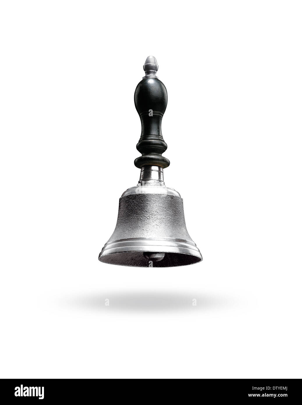 Hand bell floating on Grey with holding shadow Stock Photo
