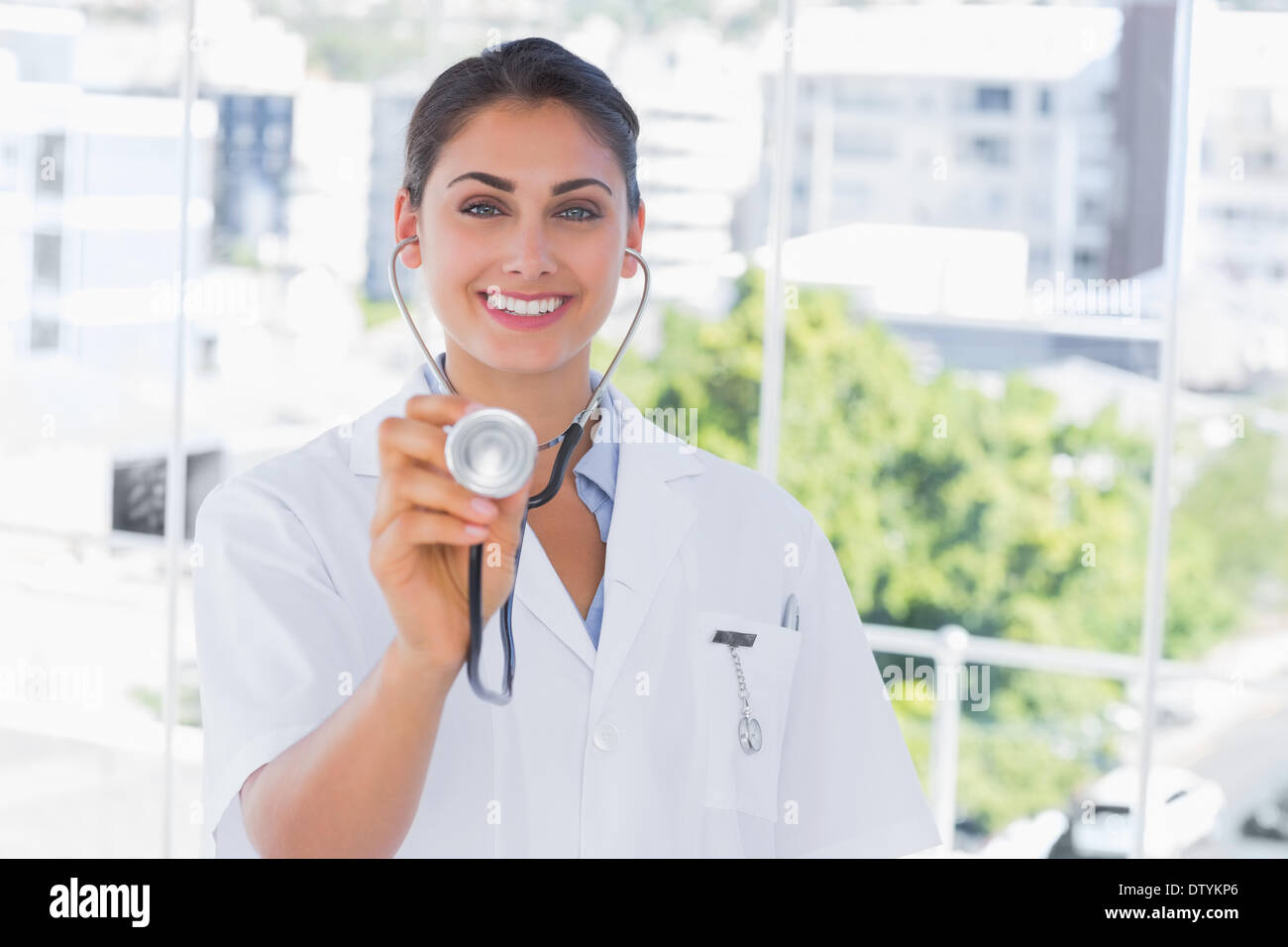 Friendly doctor listening young hi-res stock photography and images - Alamy