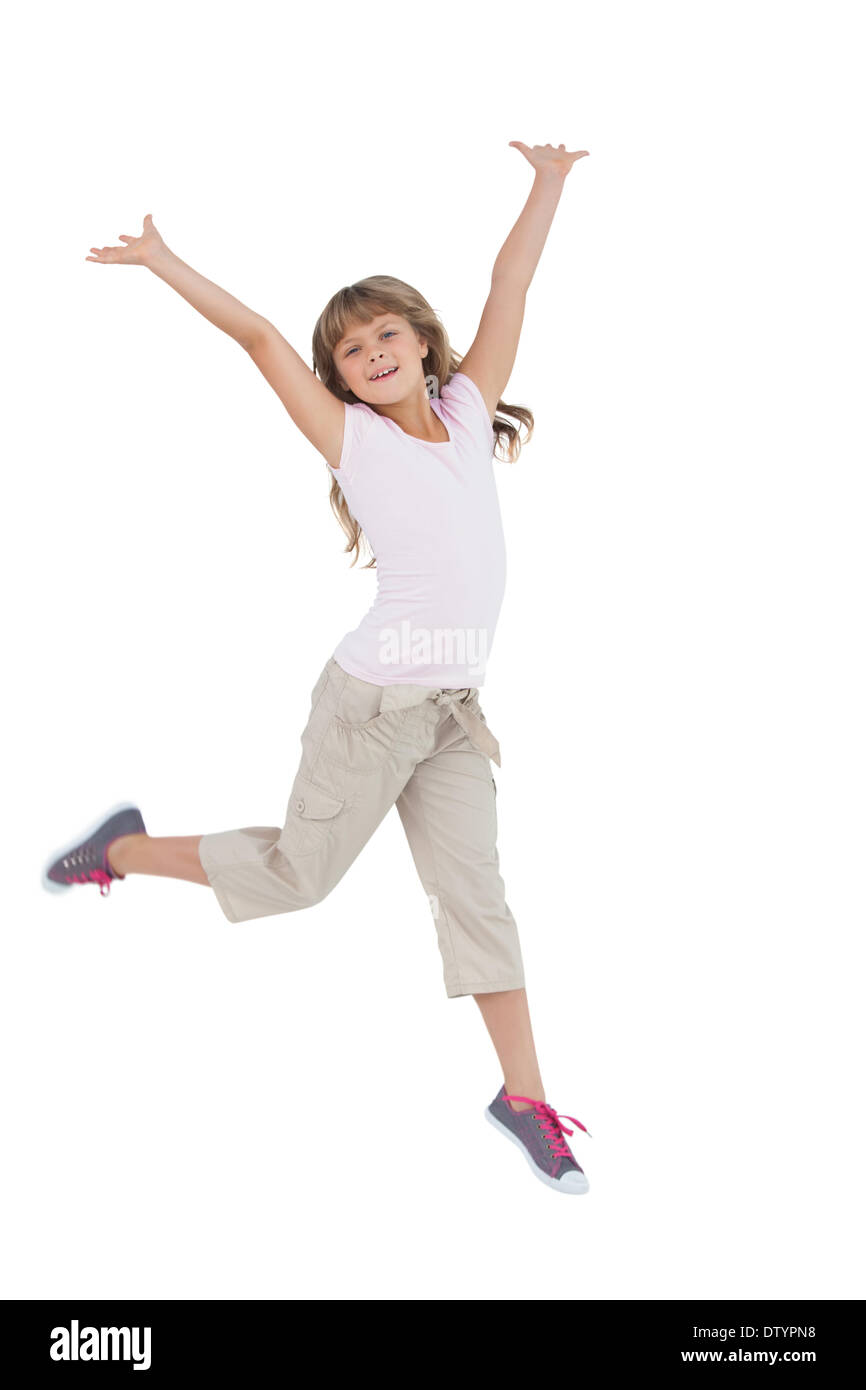 Blonde girl jumping joy Cut Out Stock Images & Pictures - Alamy