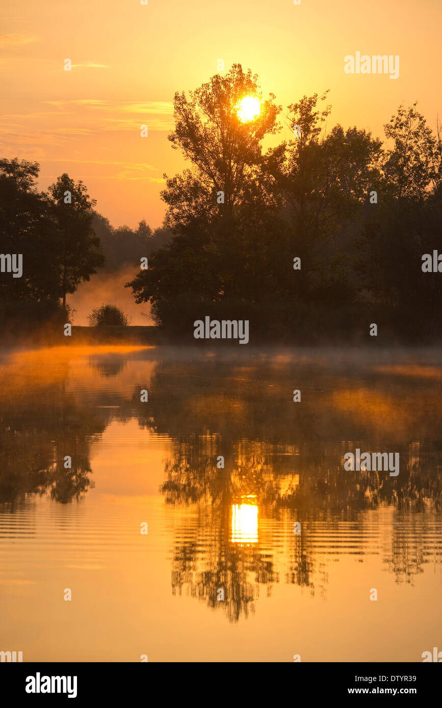 Sunrise over a pond, Herbsleben, Thuringia, Germany Stock Photo
