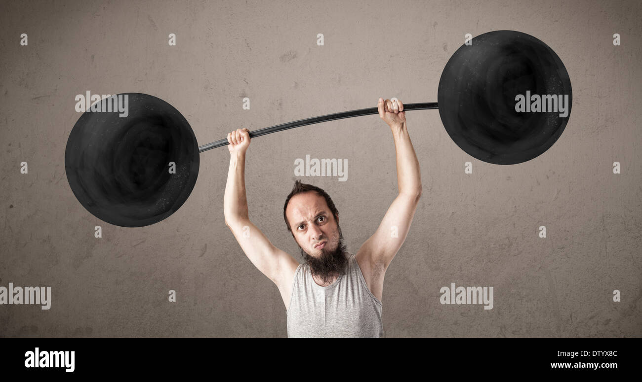 Funny skinny guy lifting weights Stock Photo Alamy