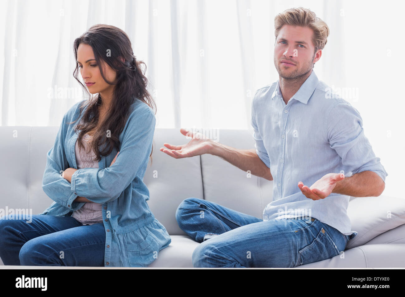 Furious blonde woman crossed arms hi-res stock photography and images ...