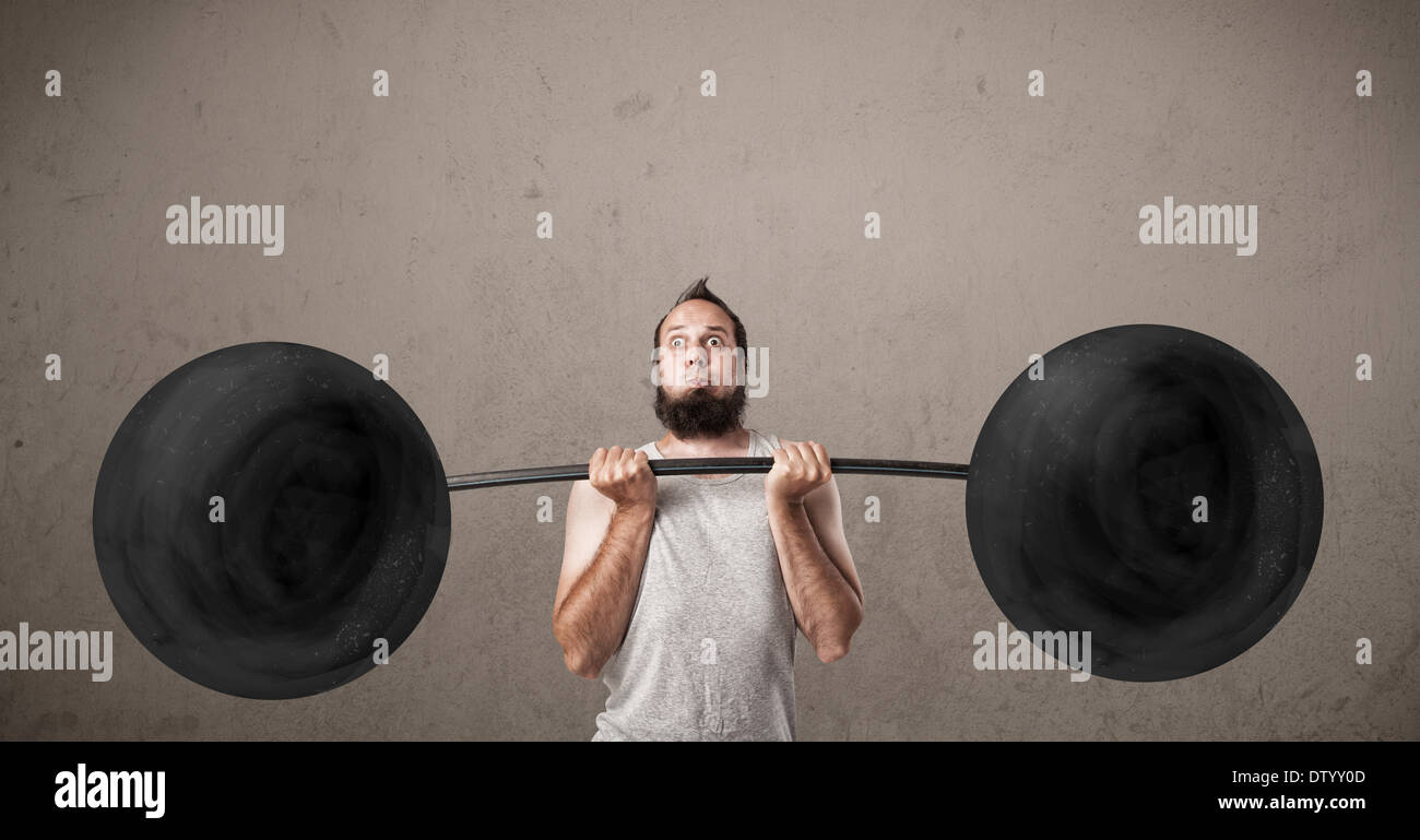 Funny skinny guy lifting weights Stock Photo Alamy