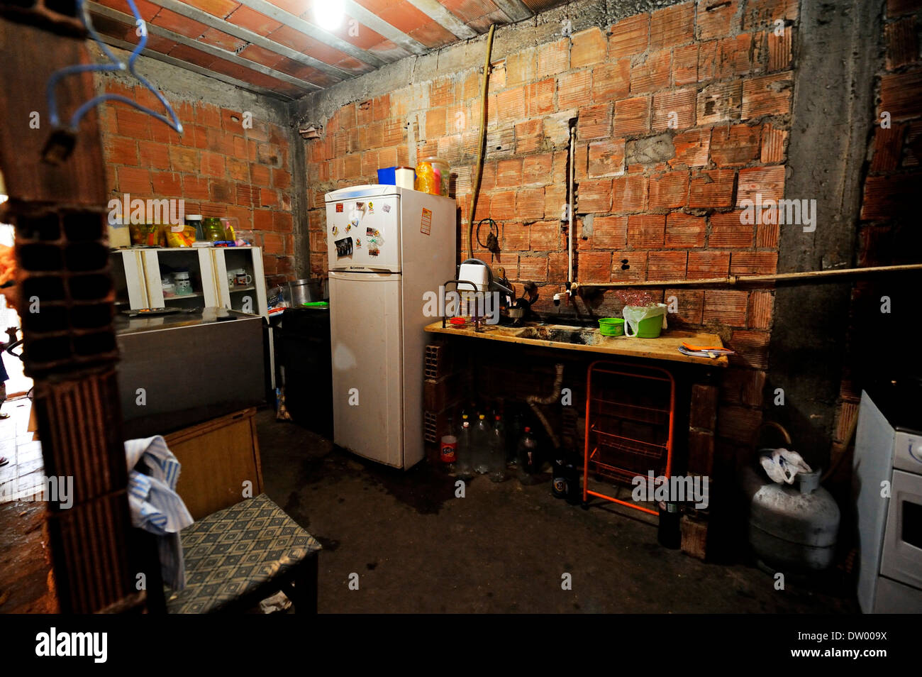 Interior view of a home, kitchen, in the slums, Favela Cerro Corá, Rio de Janeiro, Brazil Stock Photo