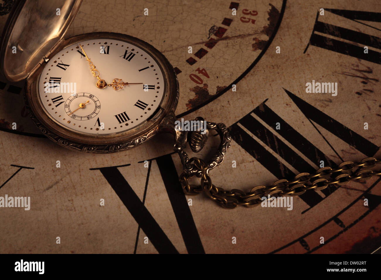 one vintage hand clock over an other old clock Stock Photo Alamy