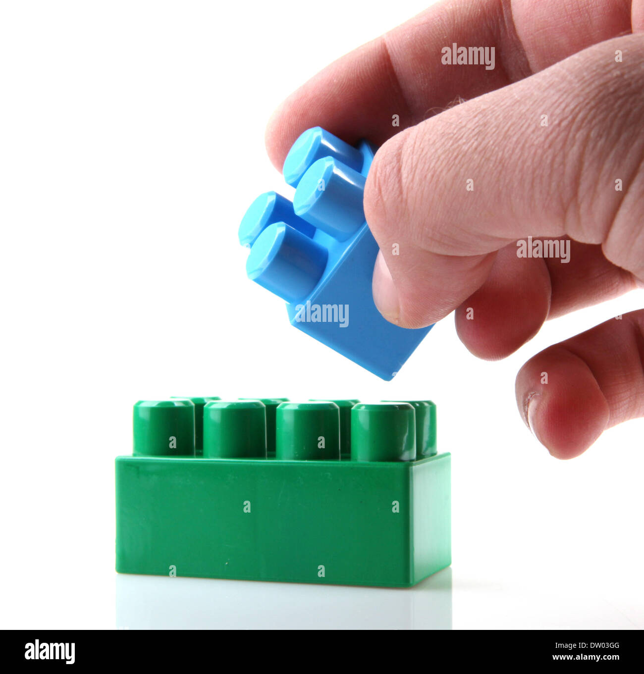 Plastic Toy Blocks On White Background Stock Photo - Alamy