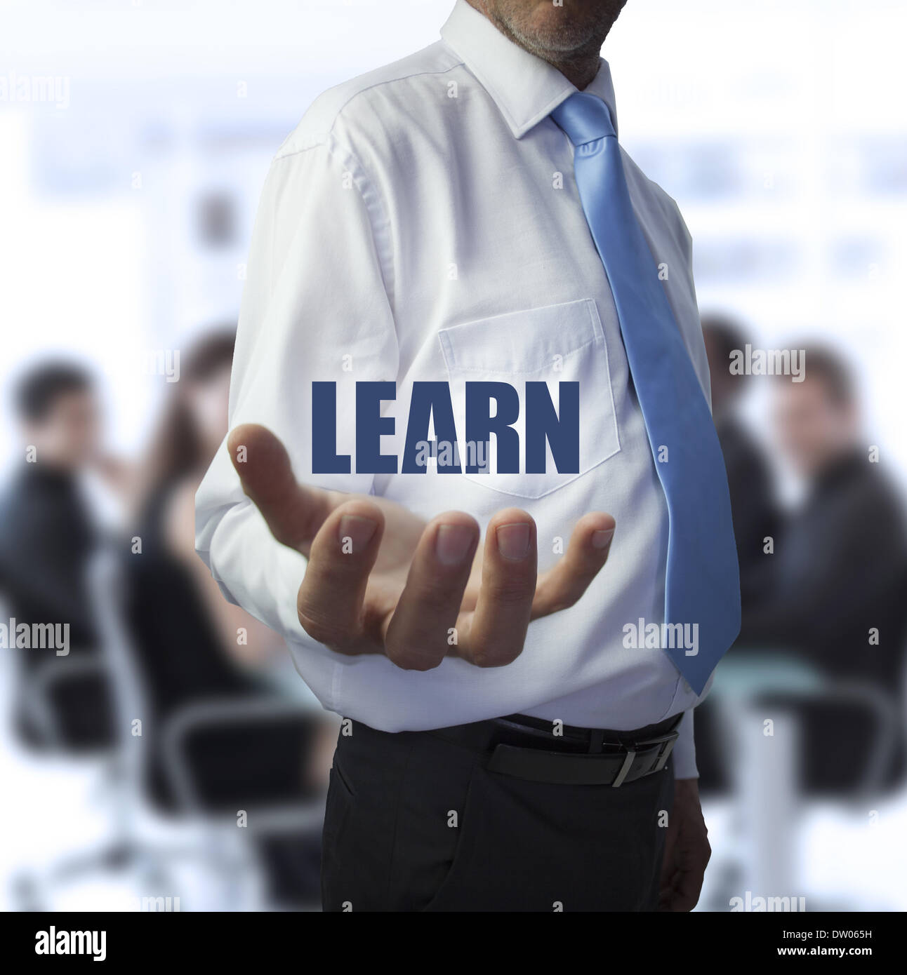 Smart Businessman Holding The Word Learn Stock Photo Alamy