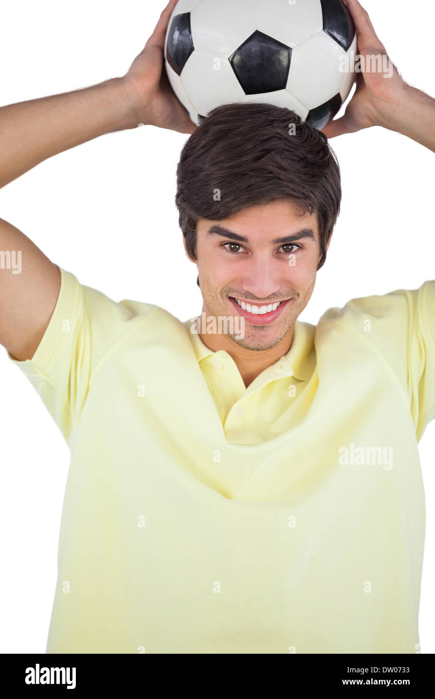 Portrait of a man holding soccer ball Stock Photo - Alamy