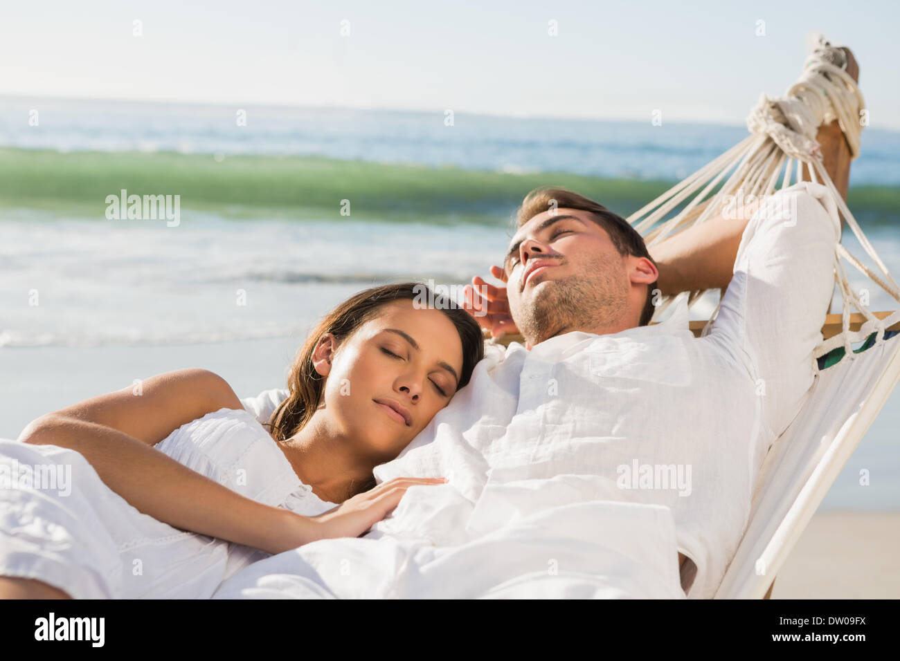 Peaceful couple napping in a hammock Stock Photo