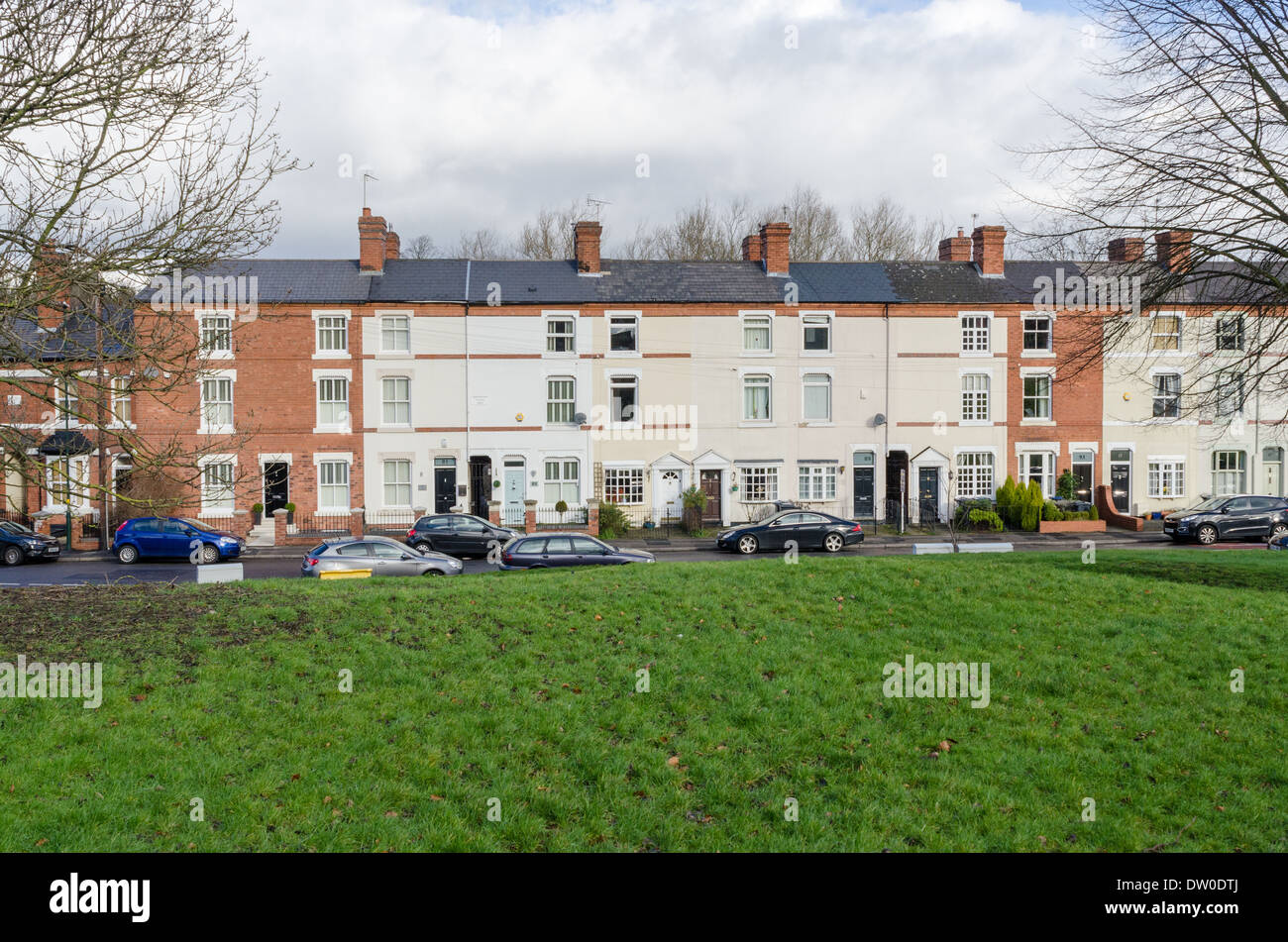 Row of three storey victorian terraced houses in North Road, Harborne